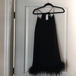 Sugar lips black dress with fur trim